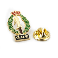 Pin GOE COE verde/dorado